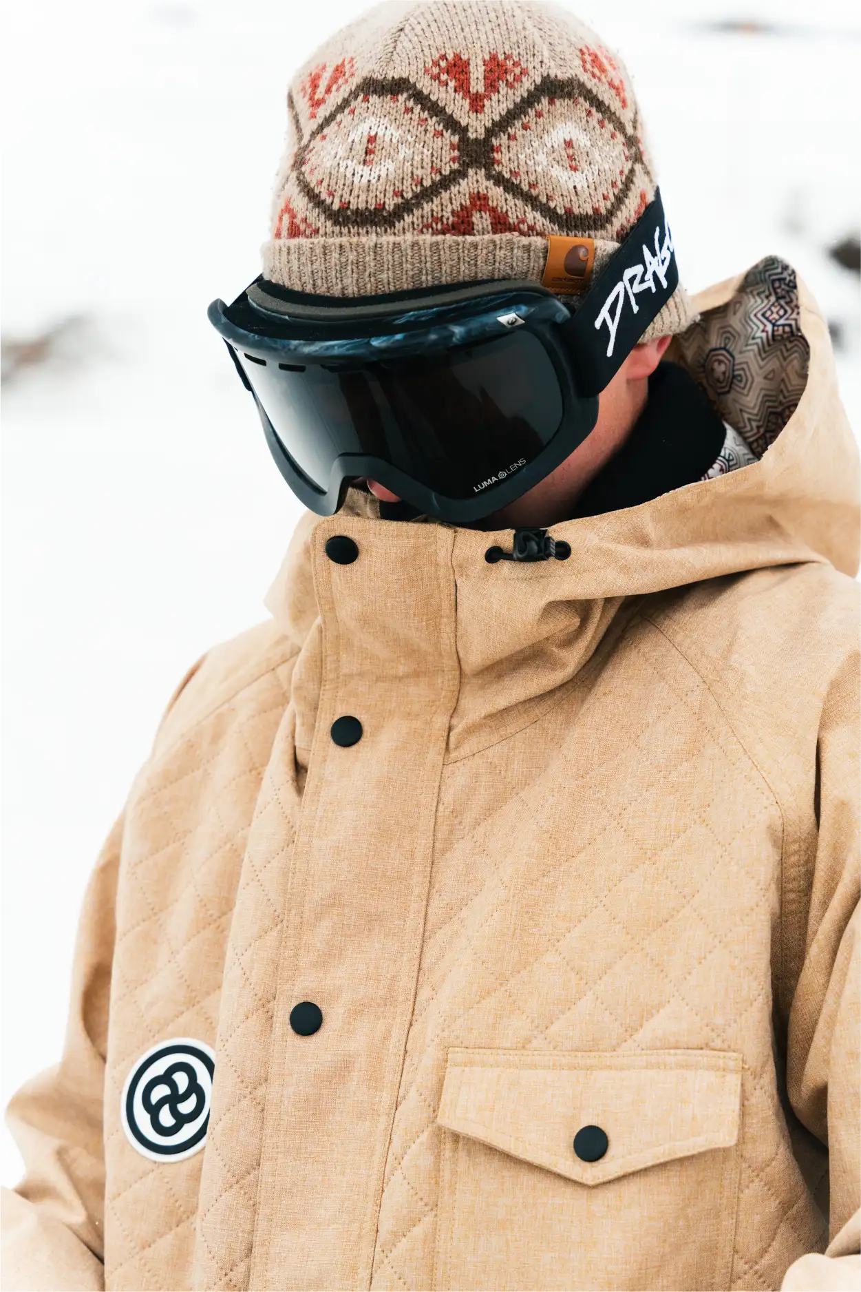 Man warming up in the best quilted ski jacket