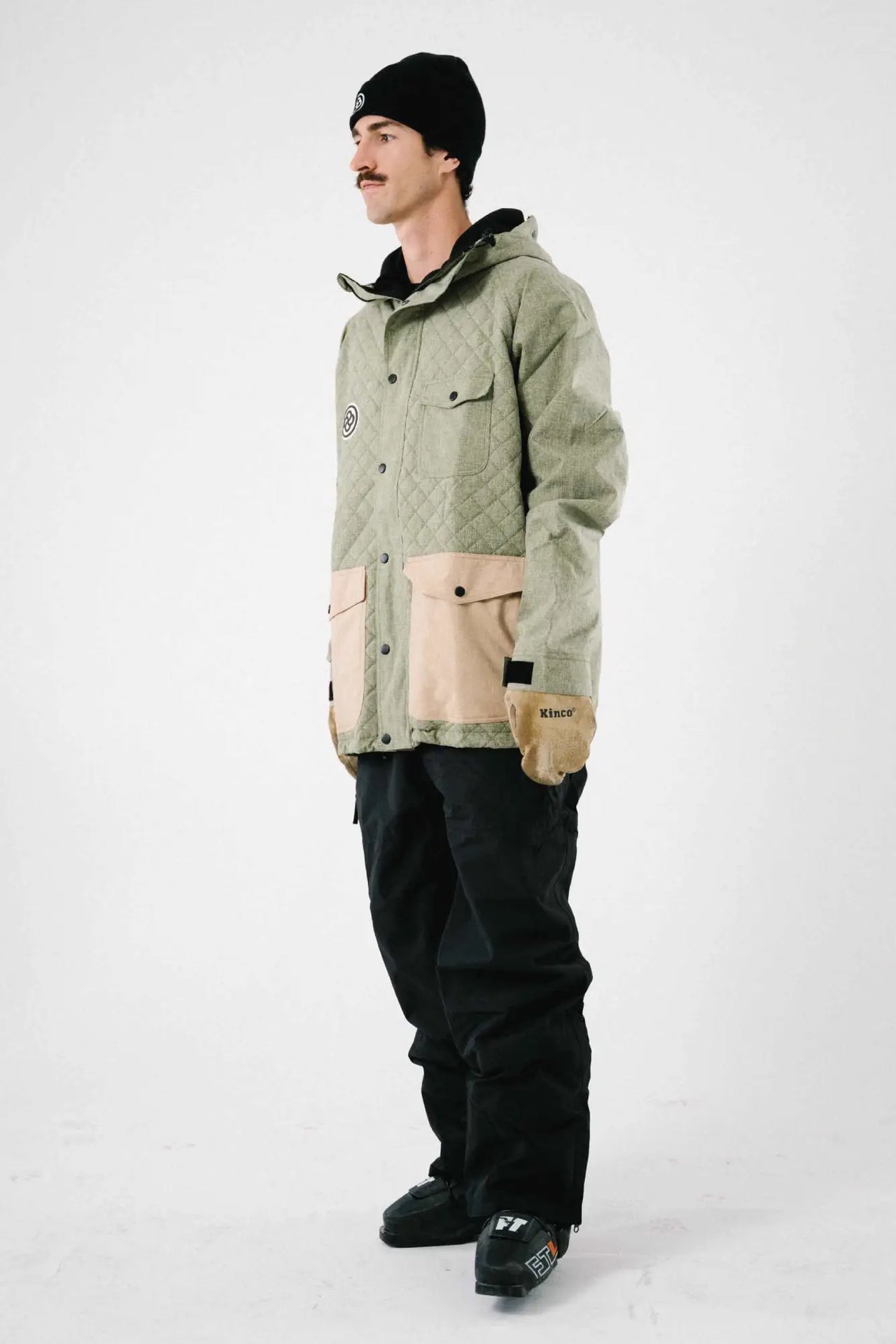Man wearing a cool outfit for skiing or snowboarding