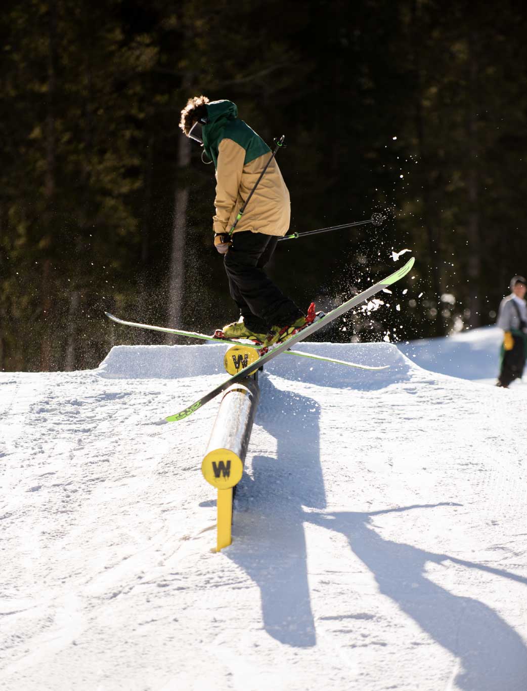 man slides rail in anorak shell jacket with baggy fit