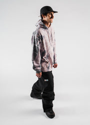 Portrait showing the fit of black baggy snowboard pants