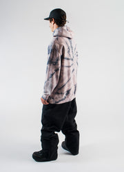 Model wearing black baggy snowboard pants