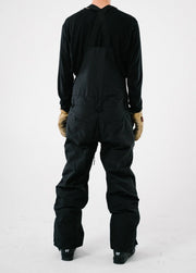 Back studio view of a men's black ski bib