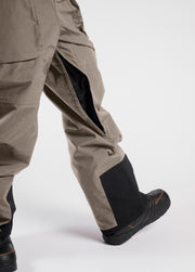 Brown baggy snowboard pants with mesh leg vents