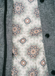 Gray ski jacket with psychedelic liner print
