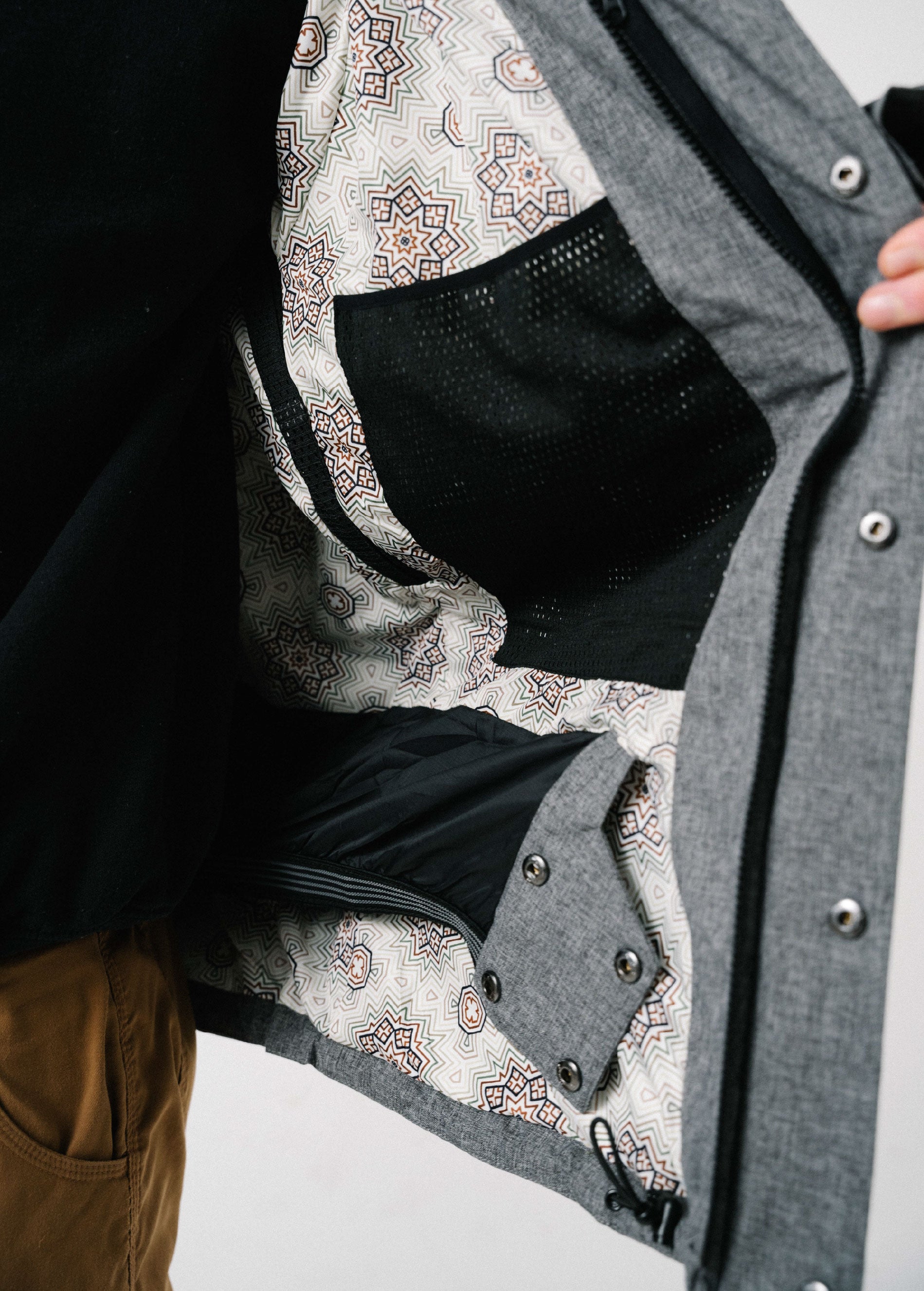 Gray ski jacket with snow skirt