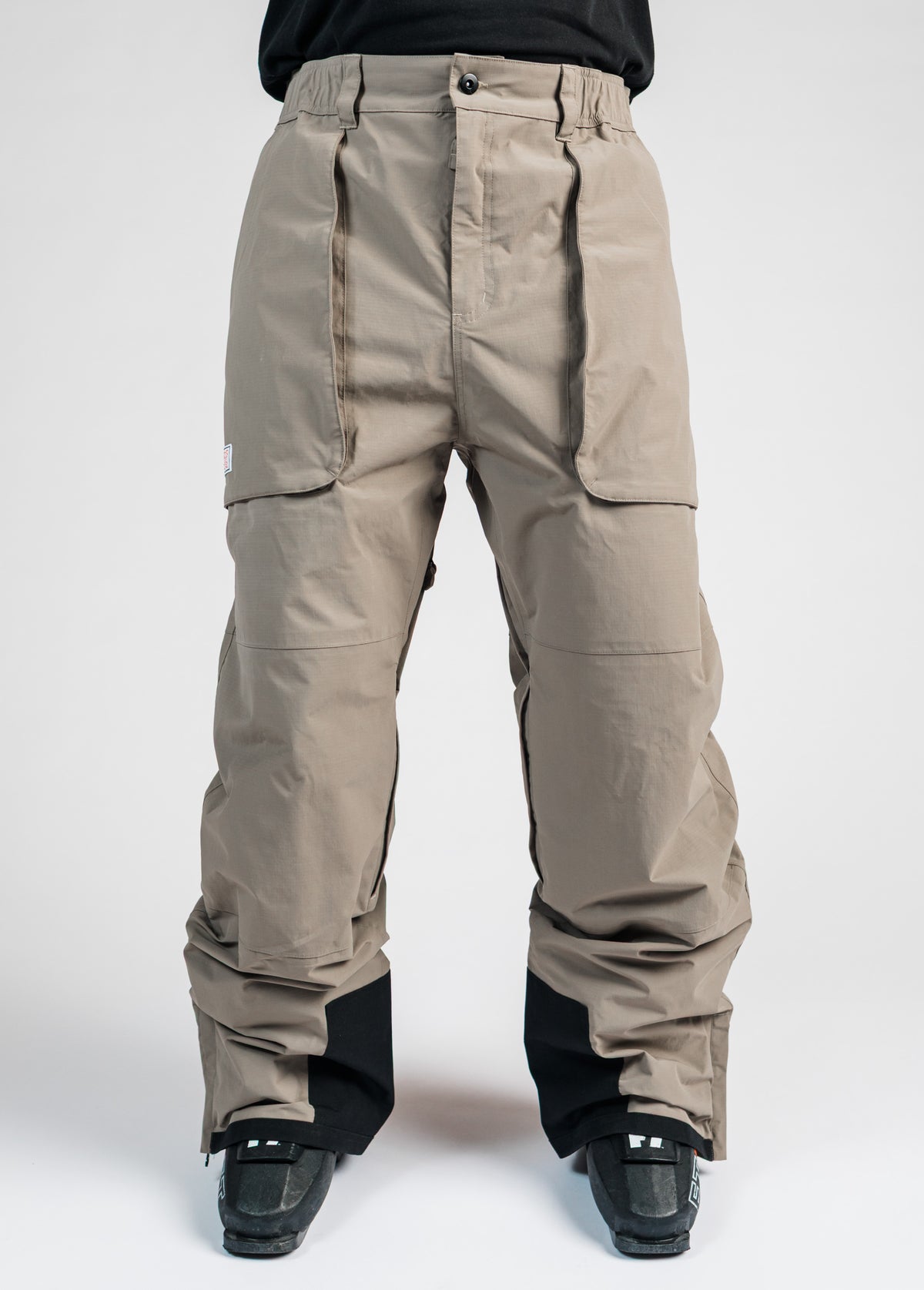 Taupe brown baggy ski pants - front view