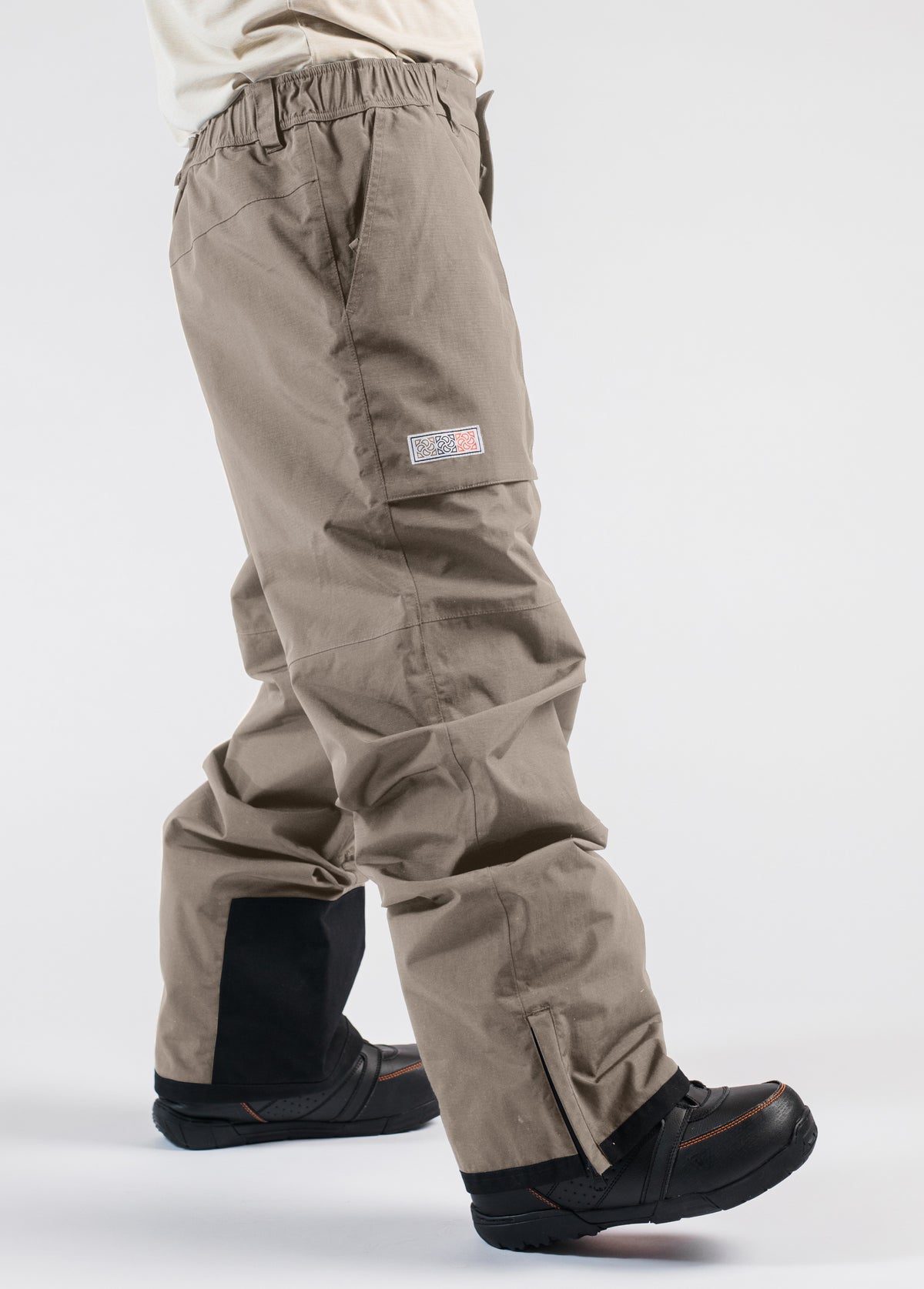 Brown baggy snowboard shell pant - side view