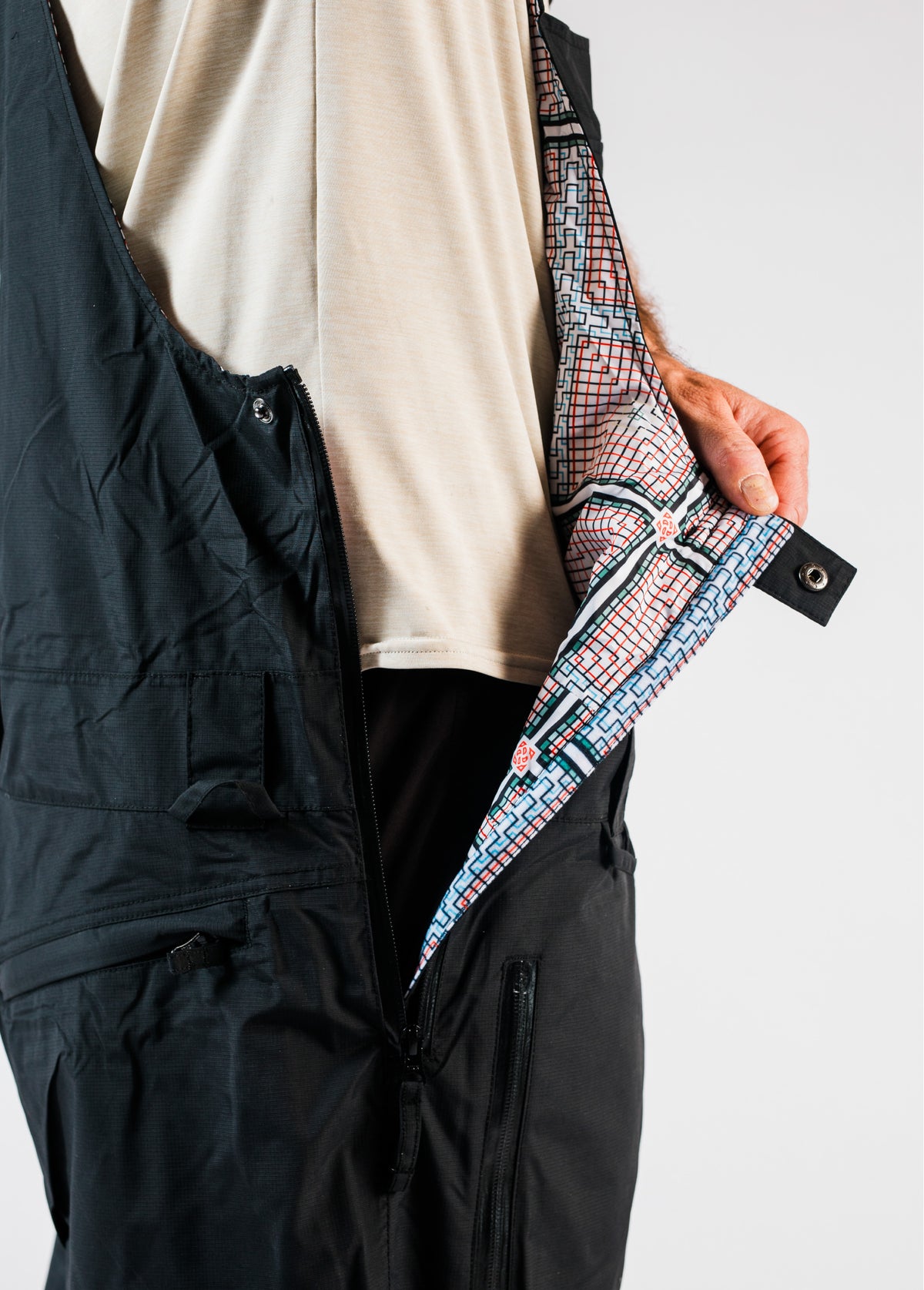 Men's black snowboard bib with polyester liner print