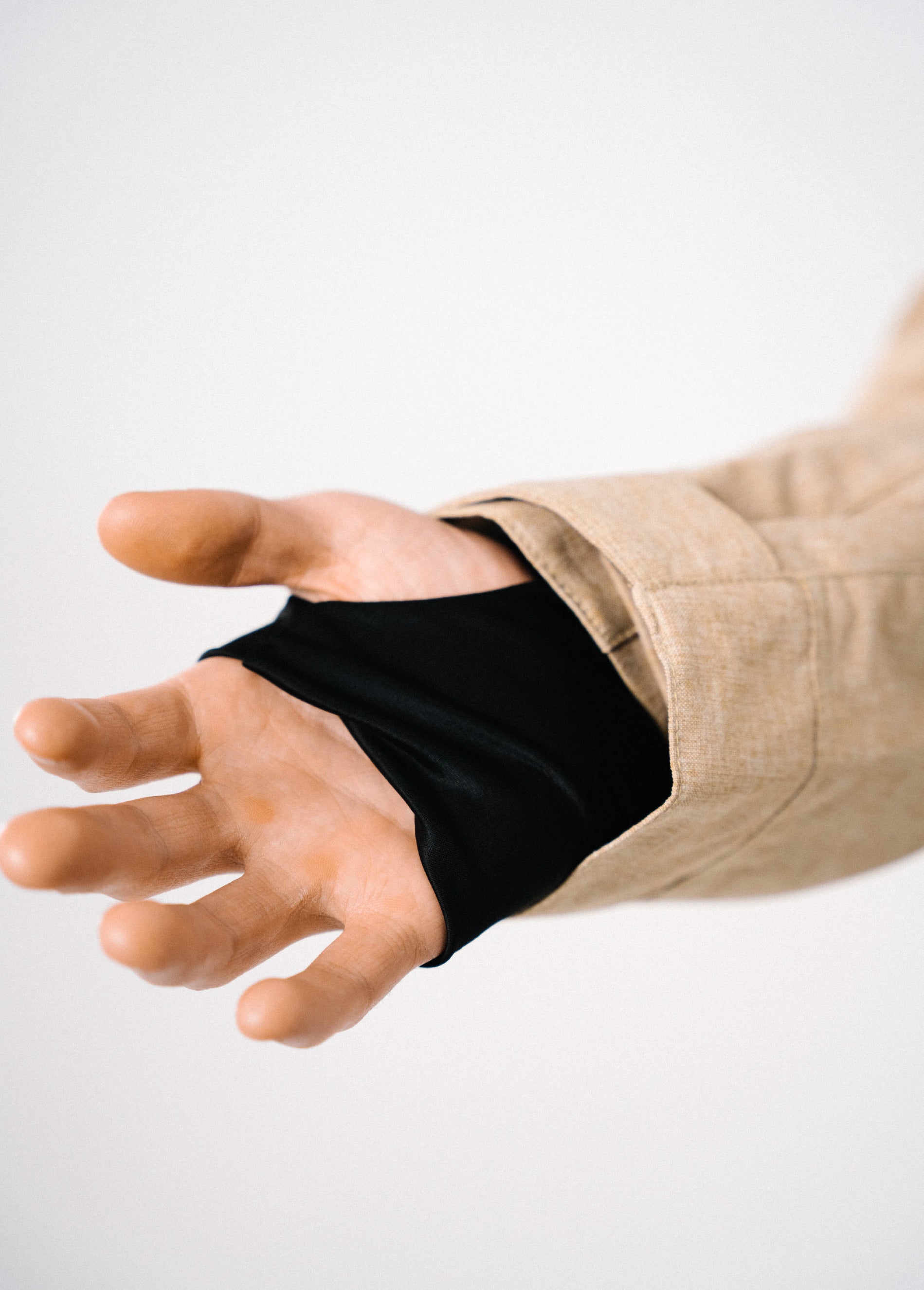 Tan ski jacket with wrist gaiter